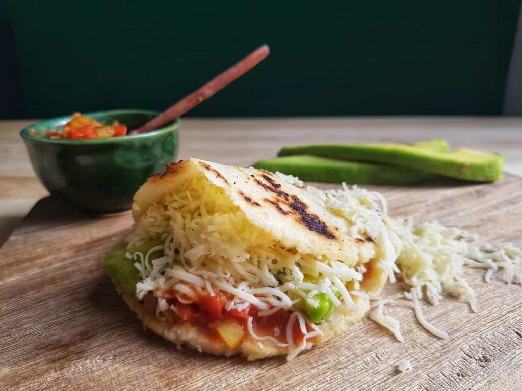 Arepas Rellenas stuffed with cheese, Hogao and avocado