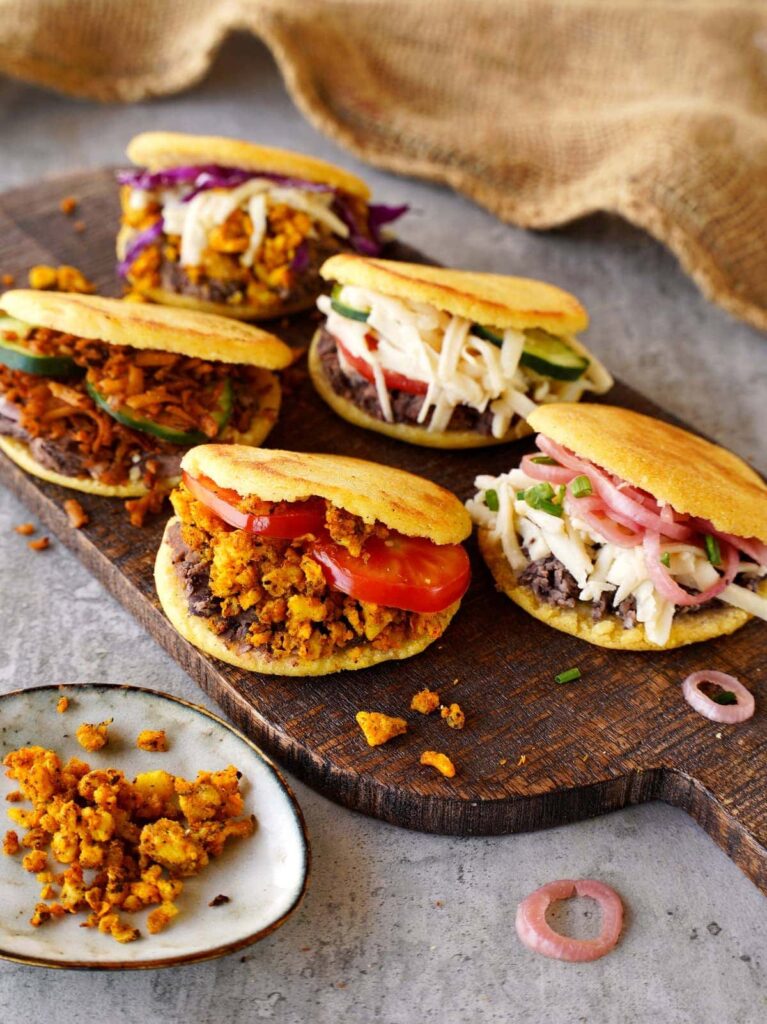 Arepas on a wooden board