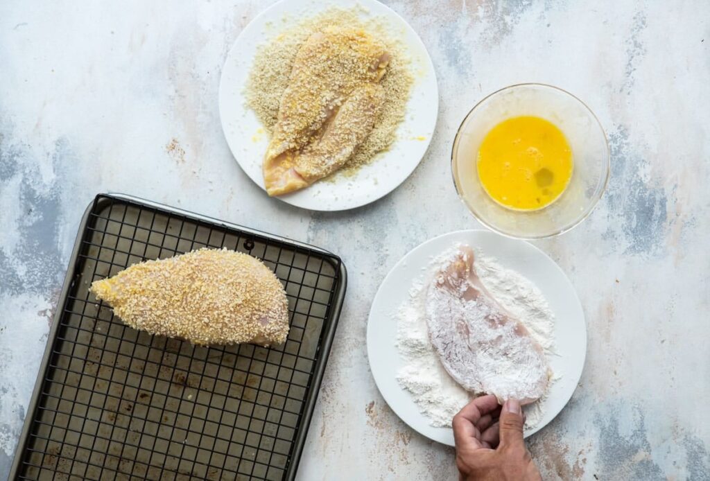 breading process involves dipping the meat in beaten eggs