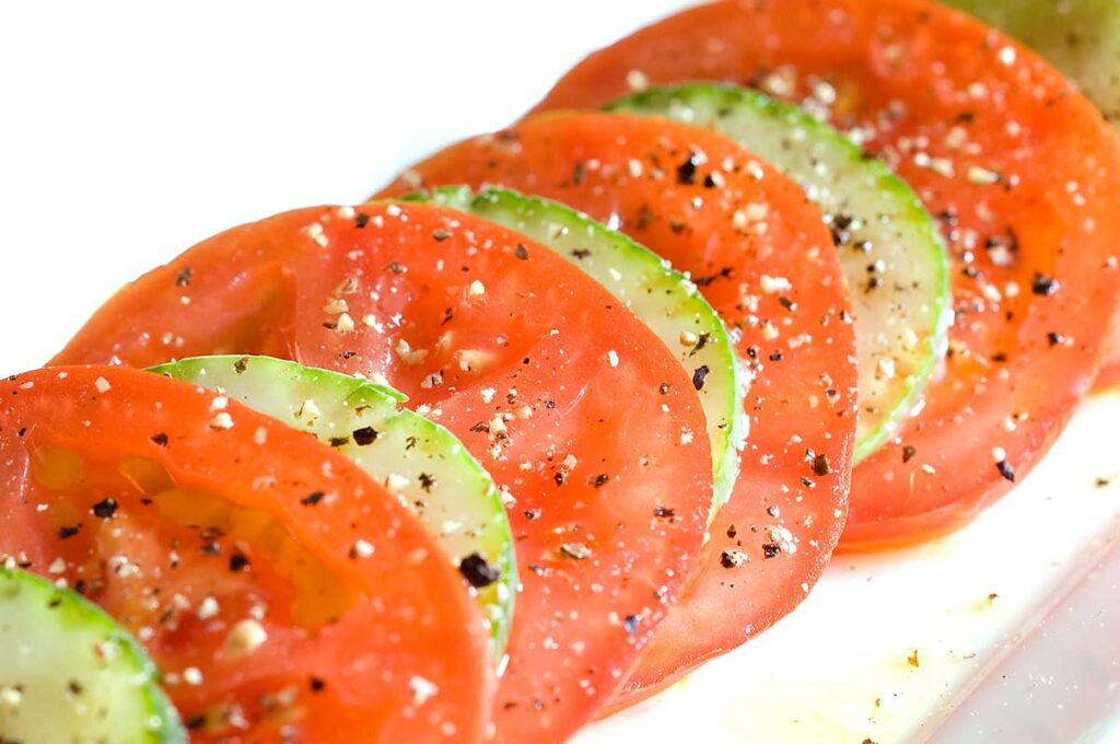 Sliced tomato and cucumber