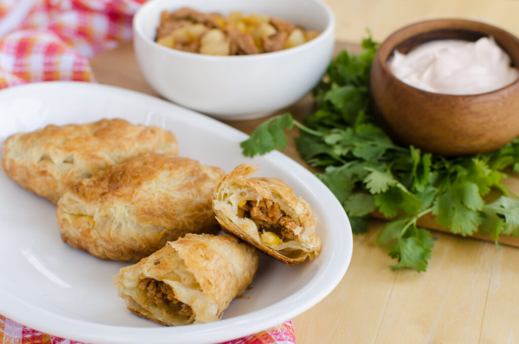 Baked Empanada with sour cream